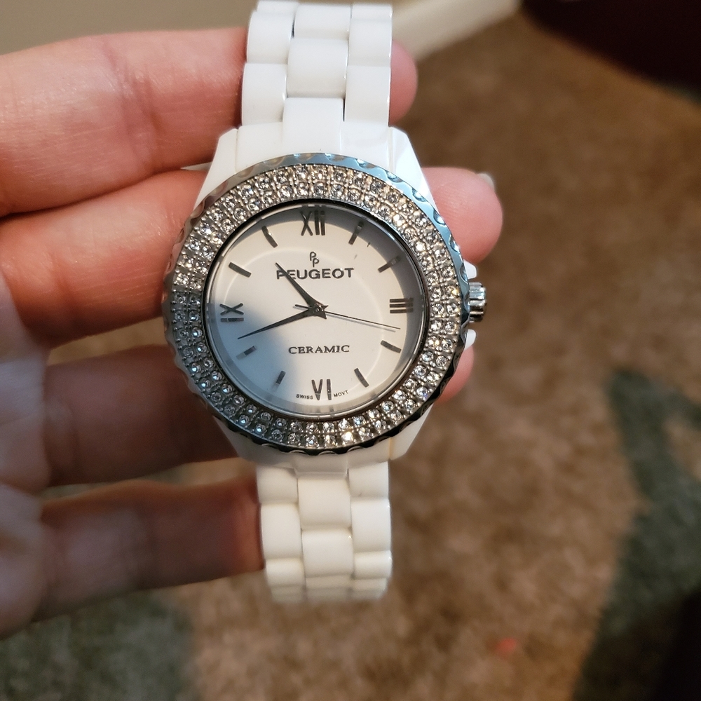 White ceramic Peugeot watch w crystal bezel
